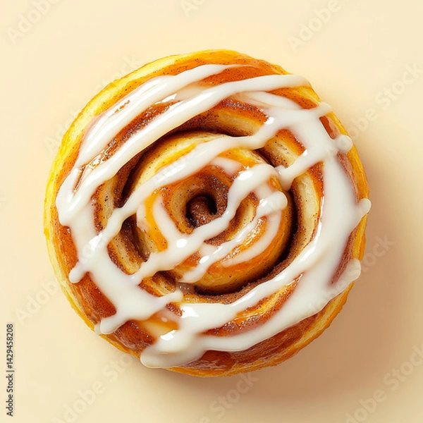 Obraz Soft and scrumptious cinnamon roll adorned with creamy white icing and rich caramel drizzle showcasing a delightful dessert experience