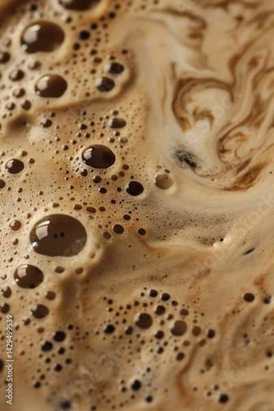 Fototapeta Close-up of coffee foam and swirl pattern. Beverage texture concept.