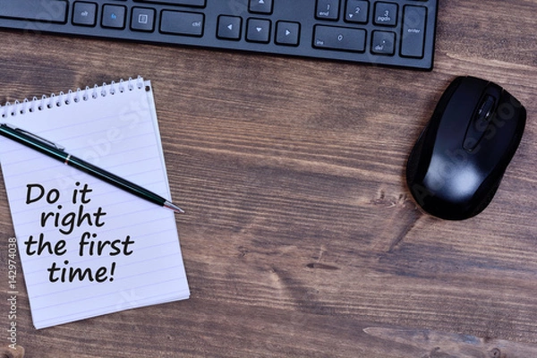 Fototapeta Text Do it right the first time on notepad
