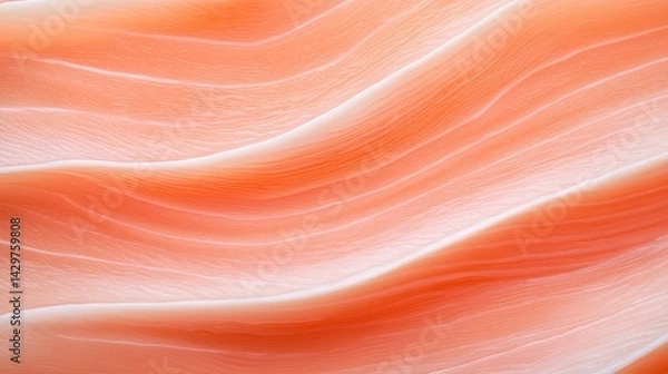 Fototapeta A smooth, wavy texture in shades of peach and cream, resembling flowing fabric or abstract art.