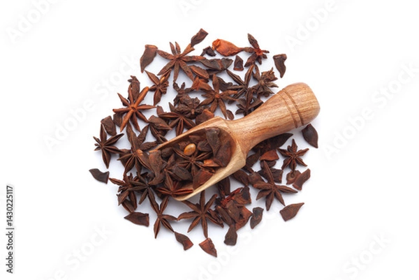 Obraz A wooden scoop filled with organic Star anise or Chakra Phool (Illicium verum), placed on a heap of Star anise, isolated on a white background.