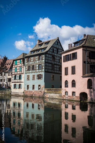 Fototapeta Strasbourg medieval buildings reflected in River Ill
