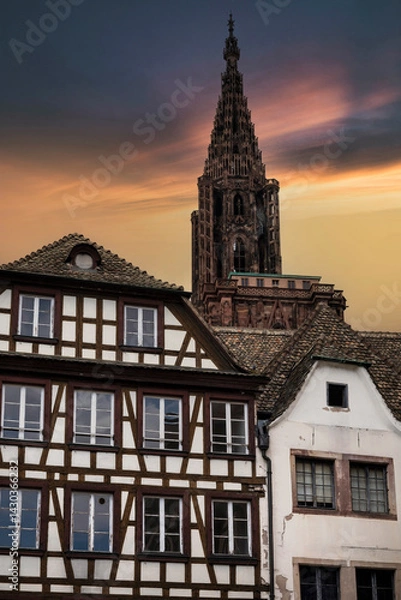 Fototapeta Medieval buildings and steeple of Strasbourg cathedral in Alsace, France
