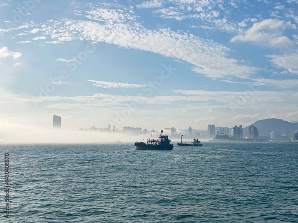 Obraz Cityscape Emerging from Fog in Hong Kong
