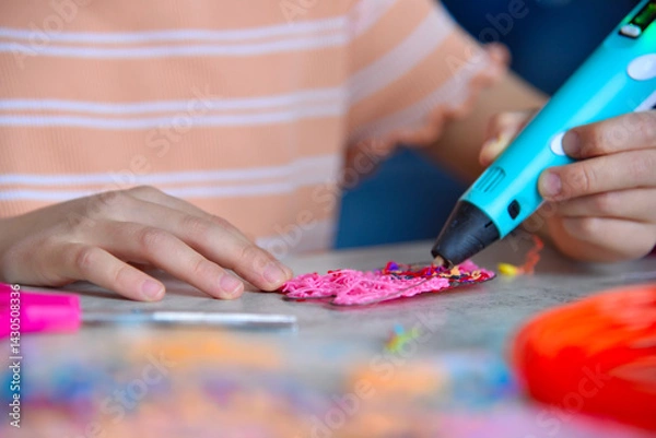Obraz Girl hands creating plastic 3D model with 3d pen