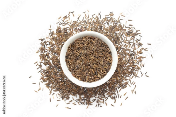 Obraz A bowl of Organic Bitter Cumin Seeds (Centratherum anthelminticum) or Kalijiri, placed over a heap of whole Bitter Cumin Seeds. Isolated on a white background.