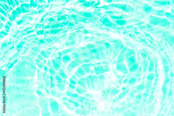 Fototapeta Blue water with ripples on the surface. Defocus blurred transparent blue colored clear calm water surface texture with splashes and bubbles. Water waves with shining pattern texture background.