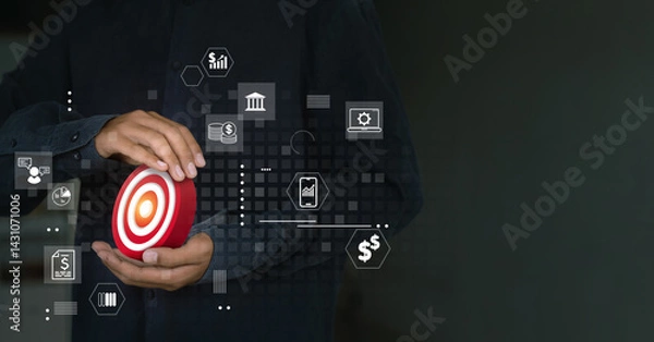 Obraz A man holds a target surrounded by digital business and finance icons.