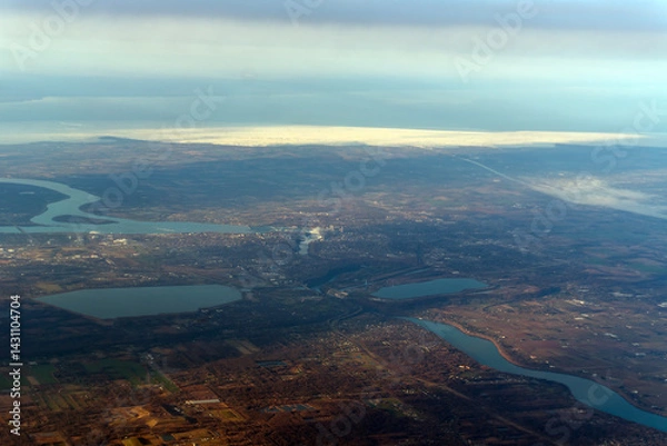 Fototapeta A high altitude view of the Niagara River following into Lake Ontario, Canada
