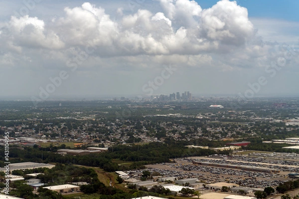Fototapeta An aerial view overlooking the suburbs towards the skyline of downtown Tampa in Florida, USA