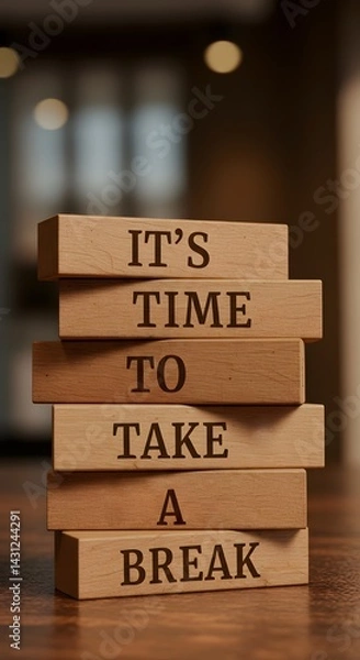 Obraz Stacked wooden blocks reading “It’s Time to Take a Break,” symbolizing the importance of rest, self-care, and work-life balance in a busy or stressful lifestyle.








