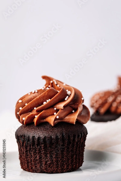 Fototapeta chocolate cupcake with icing