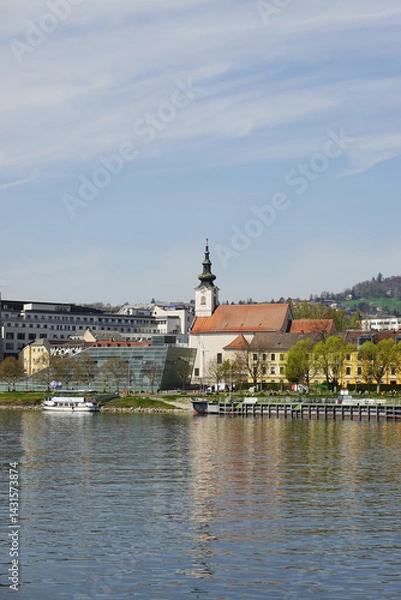 Fototapeta A riverside embankment in Linz, the river Danube, Austria       