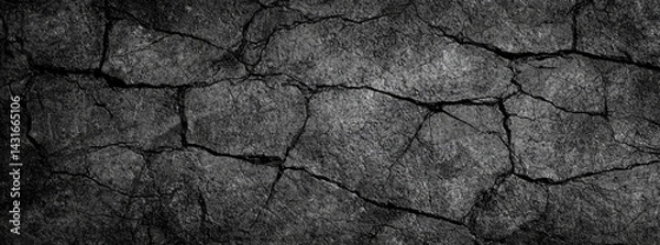 Obraz textured black and gray grunge background featuring cracked stone patterns, evoking sense of depth and ruggedness. This is perfect for various design projects