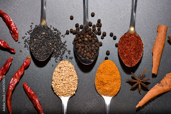 Obraz Top viewl group of spices, sesame, pepper, turmeric, cayenne pepper on spoon