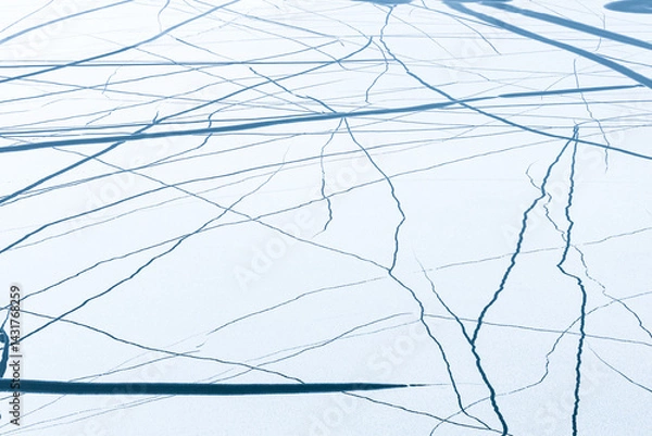 Fototapeta There are many cracks randomly located on the surface of the ice