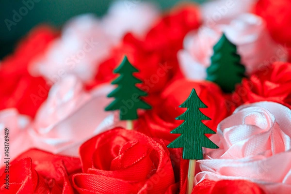 Fototapeta three wooden carved wooden trees. decorative trees in flowers