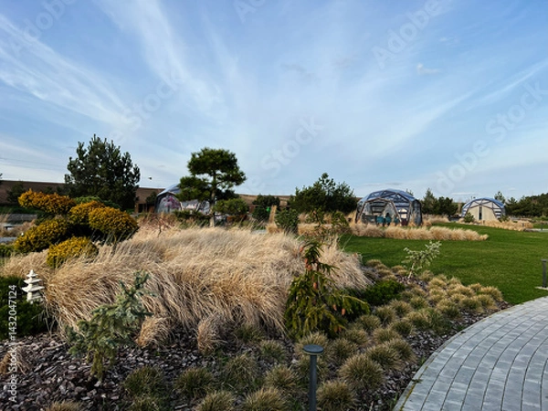 Obraz Scenic landscape featuring domed structures with greenery and natural surroundings