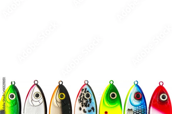 Fototapeta Multicolored jerkbaits on the pike. Multicolored fishing lures isolated on white background.