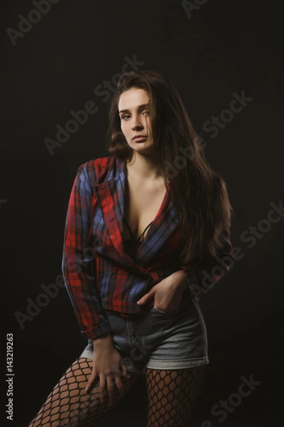 Fototapeta Awesome young model posing for model tests  in checkered jacket