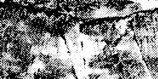 Obraz Grunge halftone gradient background. Faded grit noise texture. White and black sand wallpaper. Retro pixelated backdrop. Anime or manga style comic overlay. Vector graphic design textured template