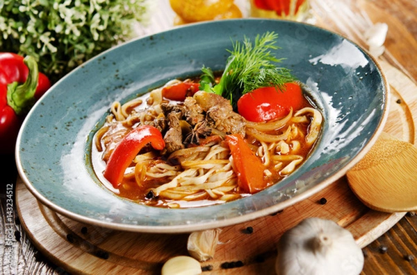 Obraz Noodles with mutton and vegetables. Central Asian cuisine. Lagman