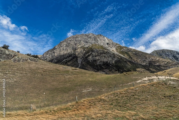 Fototapeta Surrounded by mountain ranges the extreme arid dry farming fields in the Rangitata Valley  in Canterbury NZ
