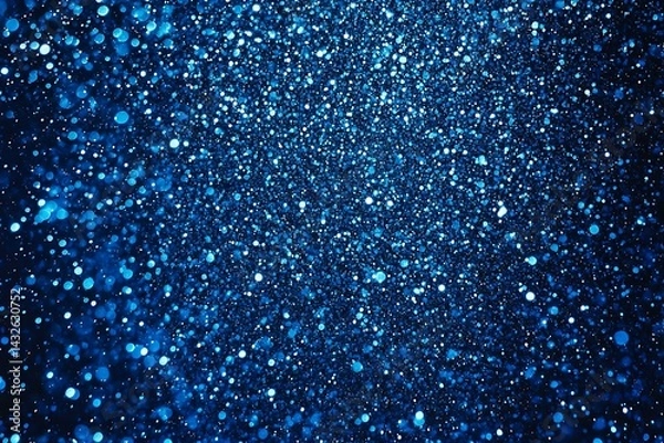Fototapeta Blue glitter background with shimmering bokeh effect creating a sparkling and festive atmosphere