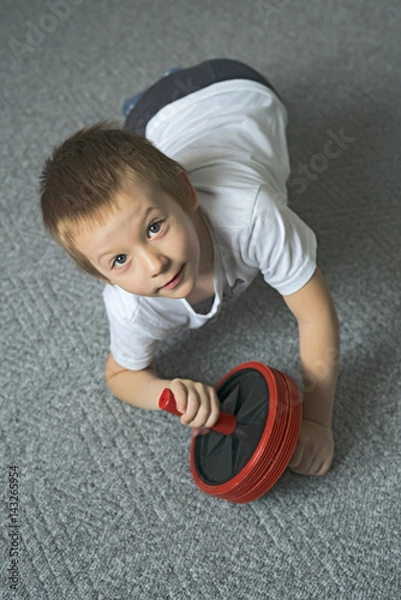 Fototapeta Boy doing exercises.