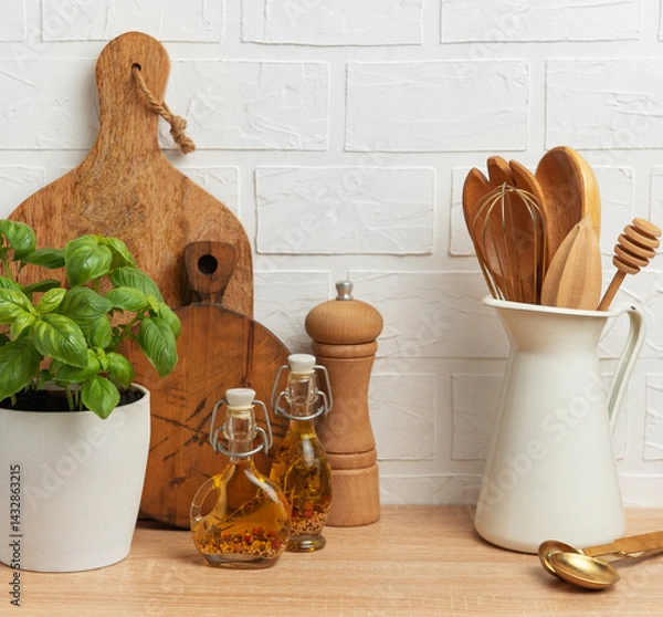 Fototapeta Rustic kitchen decor with herb and utensils