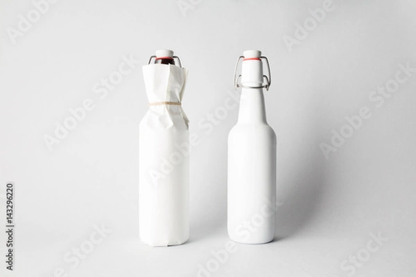 Fototapeta Two beer bottles on the scene, mock-up.