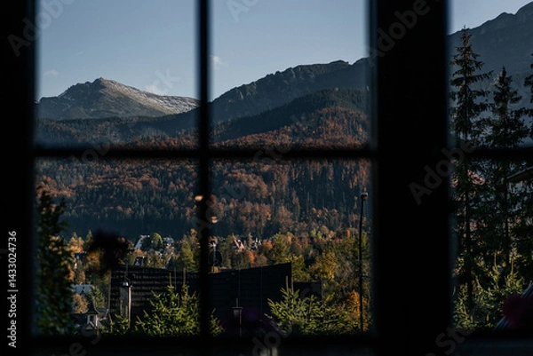 Obraz Beautiful view from the window to the forest and mountains at sunset. Autumn mountain landscape in Zakopane, Poland.