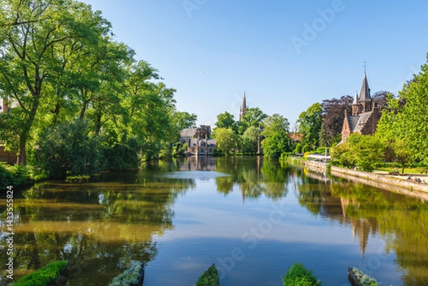 Fototapeta Scenery of Minnewater, the lake of love, located in Bruges, Belgium