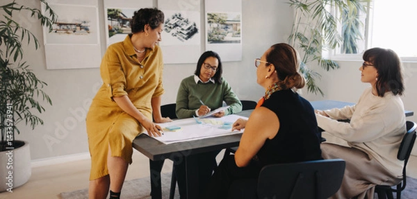 Obraz Group project management meeting fostering collaborative work environment in a modern office