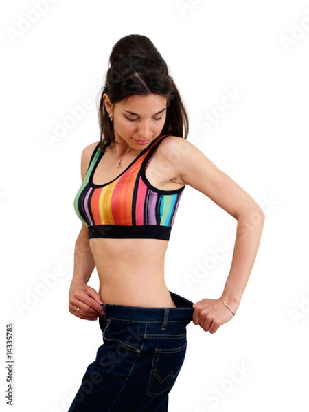 Obraz Slim lady trying on jeans after diet, looking back