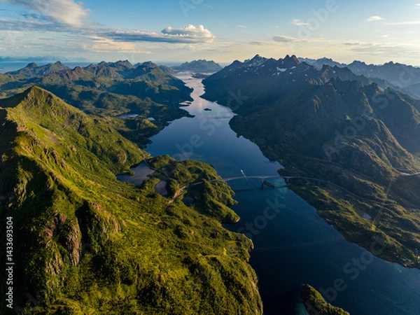 Obraz Experience the breathtaking aerial view showcasing the lush mountains along with the serene waters