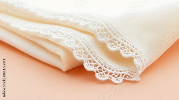Fototapeta Cream fabric with lace trim.
