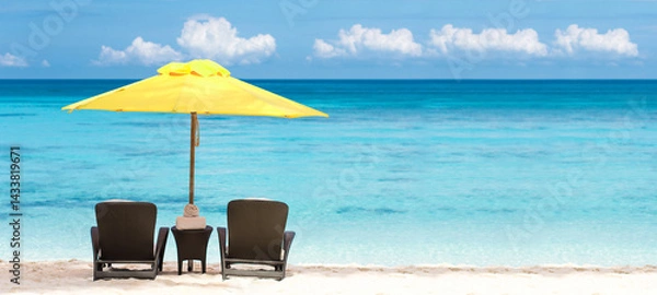 Obraz  Beach scene with two beach chairs and yellow sun umbrella. Summer vacation on tropical sea. Travel destination