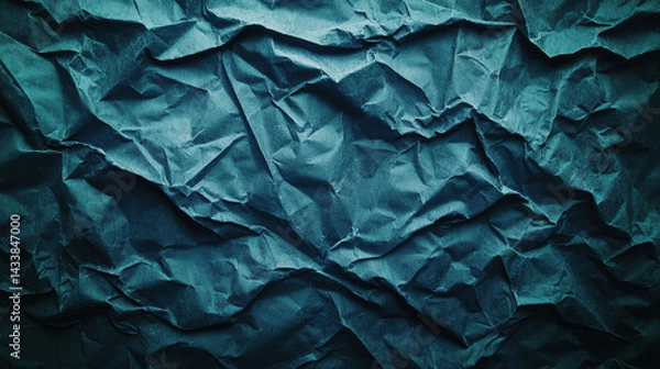 Fototapeta Crumpled paper texture in deep blue color creates artistic and abstract background