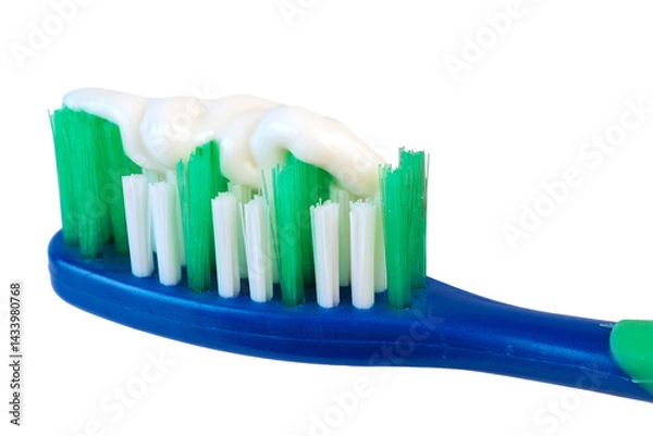 Fototapeta Close up of a toothbrush with toothpaste gel isolated on white background