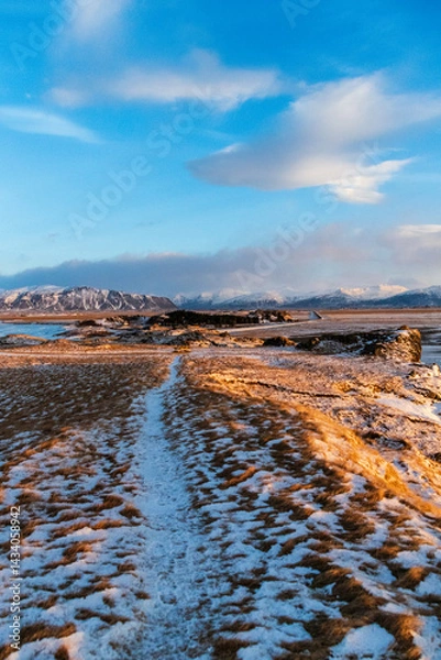 Fototapeta Outdoor shot highlighting the stunning Iclandic scenery on a frosty winter afternoon along Iceland's highway one.