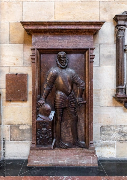 Fototapeta Knights tombstone made of red marble in St Vitus Cathedral facade in historical part of Prague in Czech Republic
