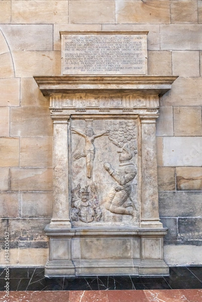 Fototapeta Knights tombstones in the St Vitus Cathedral facade in historical part of Prague in Czech Republic