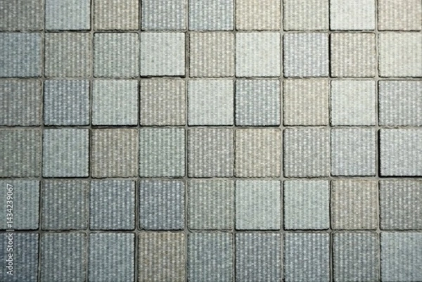 Obraz A Detailed Close-Up View of a Patterned Tile Surface with Subtle Color Variations and Textured Details