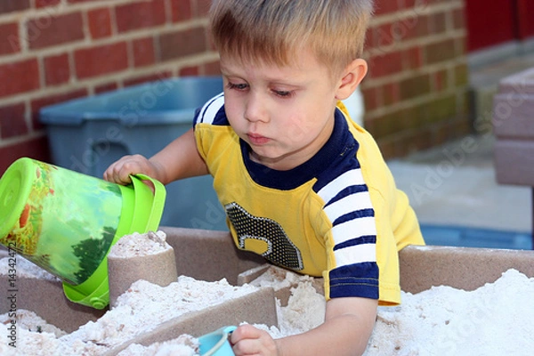 Obraz Boy playing in the Sandbox