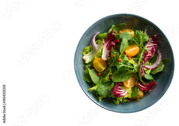 Fototapeta A top-down view of a fresh mixed salad in a matte gray ceramic bowl against a pure white background