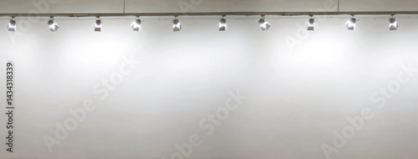 Fototapeta Empty white wall with spot lights at art gallery