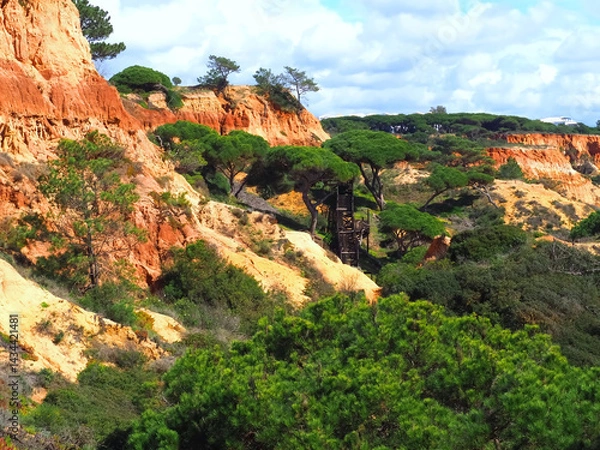 Fototapeta Algarve beach at Olhos de Agua with red cliffs at the coast of south Portugal