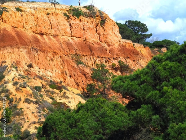 Fototapeta Algarve beach at Olhos de Agua with red cliffs at the coast of south Portugal