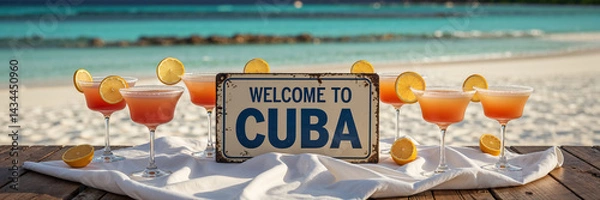 Obraz lots of cocktails on the table against the backdrop of a stunning seascape, the inscription Welcome to Cuba
